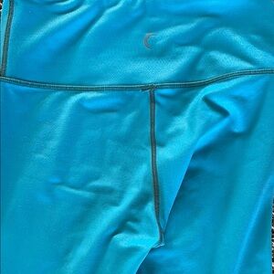 Teal/white ombré leggings. Worn a few times. Some small snag marks.